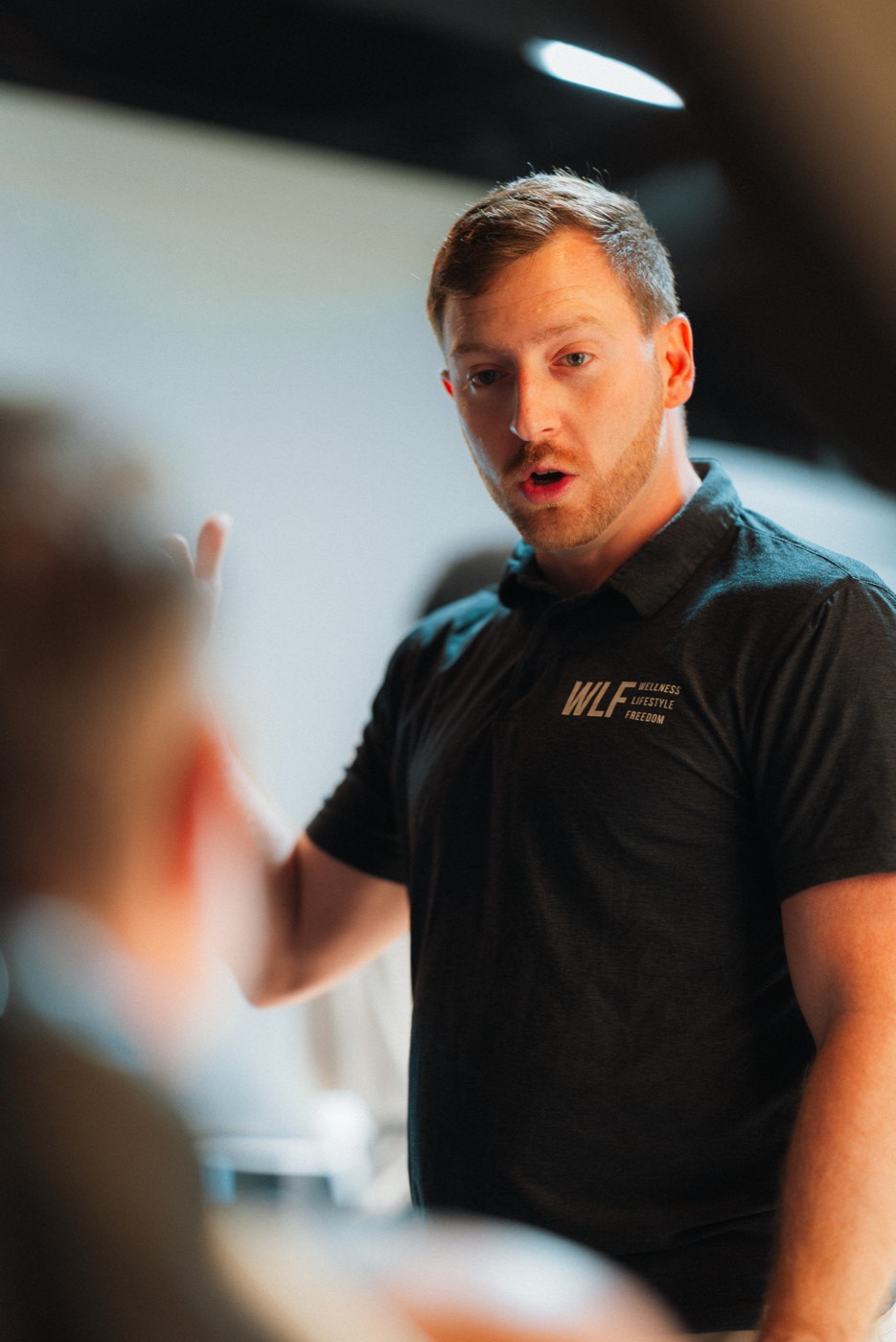Dr. Colton Purscell walking a member through his plan.